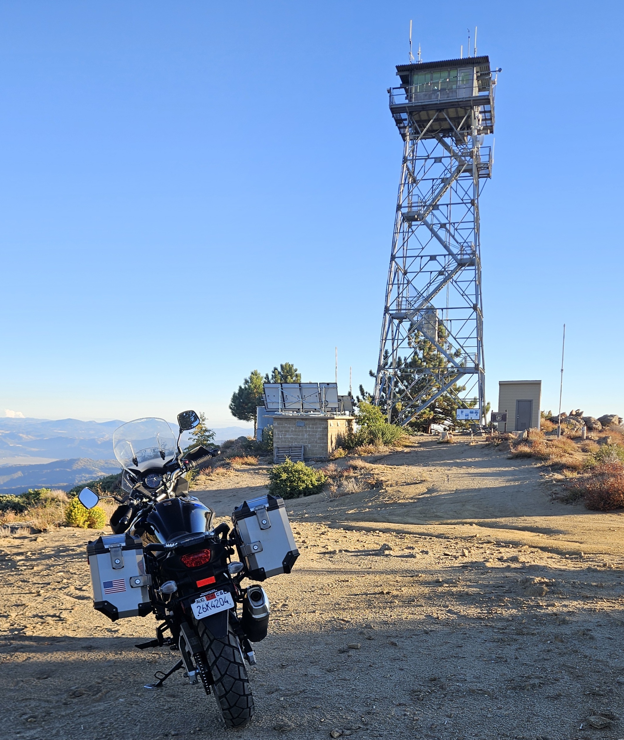 High Point Lookout tower today, standing above the bare parking flat with the ridgeline beyond